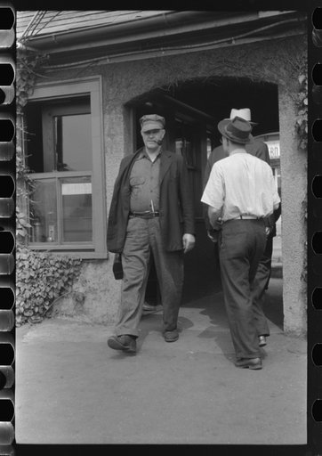 Workers entering plant at afternoon change of shift. Electric Boat Works, Groton, Connecticut