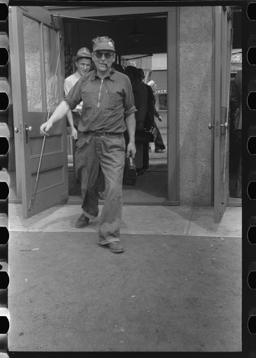 Untitled photo, possibly related to: Workers entering plant at afternoon change of shift. Electric Boat Works, Groton, Connecticut