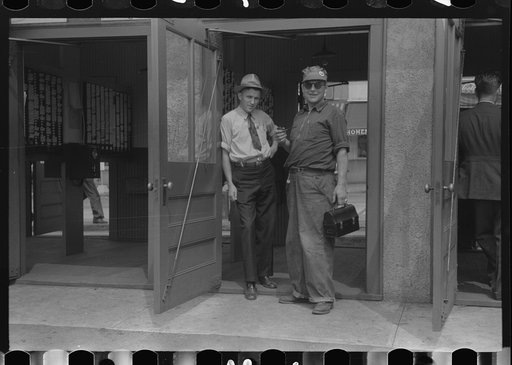 Workers entering plant at afternoon change of shift. Electric Boat Works, Groton, Connecticut