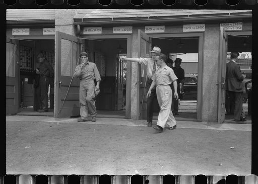 Untitled photo, possibly related to: Workers entering plant at afternoon change of shift. Electric Boat Works, Groton, Connecticut