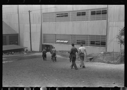 Workers entering plant at afternoon change of shift. Electric Boat Works, Groton, Connecticut