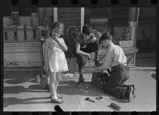 Untitled photo, possibly related to: Children shining shoes on street corner, Hartford, Connecticut
