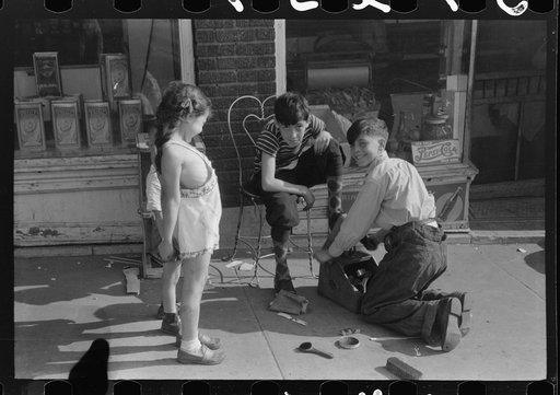 Children shining shoes on street corner, Hartford, Connecticut