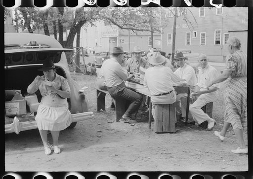 Brunswick stew dinner in front of the tobacco warehouse on opening day of the auctions. Prepared by Parent Teachers Association of Prospect Hill, to raise money for a new gymnasium for the Prospect Hill Consolidated School in Caswell County, North Carolina
