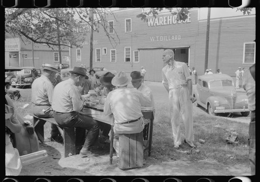 Untitled photo, possibly related to: Brunswick stew dinner in front of the tobacco warehouse on opening day of the auctions. Prepared by Parent Teachers Association of Prospect Hill, to raise money for a new gymnasium for the Prospect Hill Consolidated School in Caswell County, North Carolina