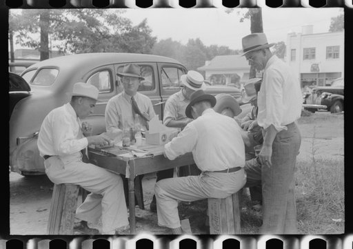 Untitled photo, possibly related to: Brunswick stew dinner in front of the tobacco warehouse on opening day of the auctions. Prepared by Parent Teachers Association of Prospect Hill, to raise money for a new gymnasium for the Prospect Hill Consolidated School in Caswell County, North Carolina