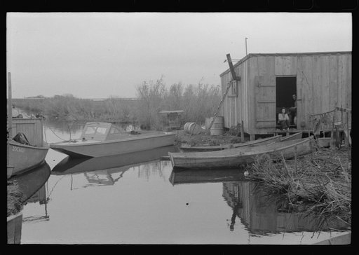 Untitled photo, possibly related to: Spanish muskrat trappers' camp on bay or in marshes near Delacroix Island, Louisiana