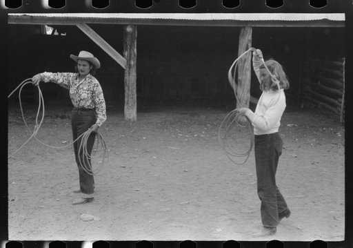 Dudes learning how to throw a rope, "roping" during a ranch rodeo contest. Brewster Arnold Quarter Circle U Ranch, Birney, Montana