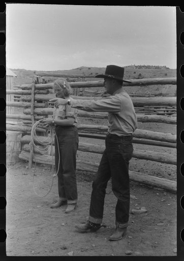 Dudes learning how to throw a rope, "roping" during a ranch rodeo contest. Brewster Arnold Quarter Circle U Ranch, Birney, Montana