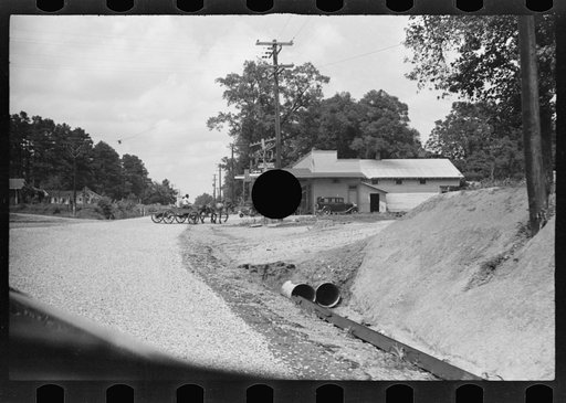 Untitled photo, possibly related to: Roadside scene, Alabama. Approach to Moundville