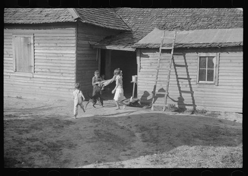 Burroughs children playing in the yard, Hale County, Alabama