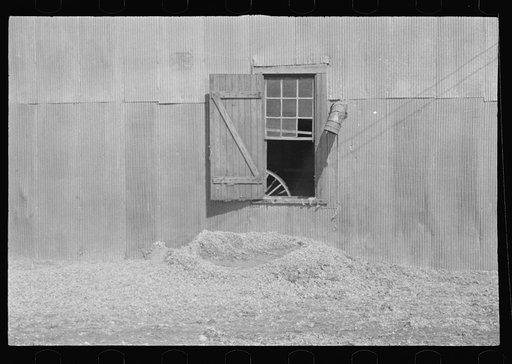 Tin wall of the cotton gin building. Vicinity of Moundville, Alabama
