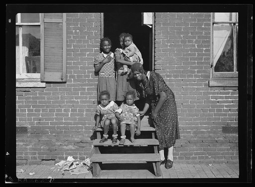Youngsters in doorway of alley dwelling. Washington, D.C.