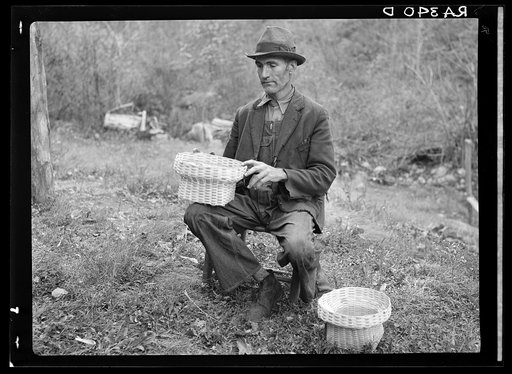John Nicholson with some of the baskets he weaves. Shenandoah National Park, Virginia