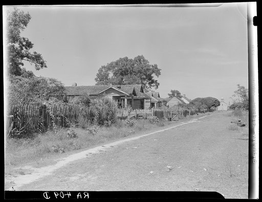Homes of laborers on one of the large abandoned sugarcane plantations. These men are now on relief. Placquemines Parish, Louisiana