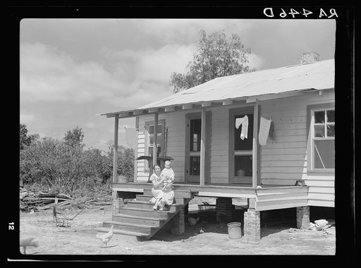 Resettled family in new house. Wolf Creek Farms, Georgia
