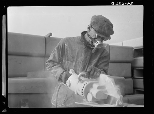 Tile cutter, Hightstown, New Jersey, showing modern health methods used in this work