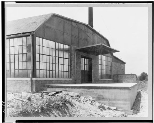 Reedsville, West Virginia. The Arthurdale subsistence homestead project of the U.S. Resettlement Administration. Vacuum cleaner factory shipping platform