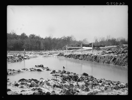 Flooded foundation sites and ice delay progress on first set of houses at the Berwyn project, Maryland