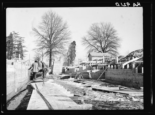 Wooden frames under construction for concrete foundations of houses at Berwyn project, Maryland