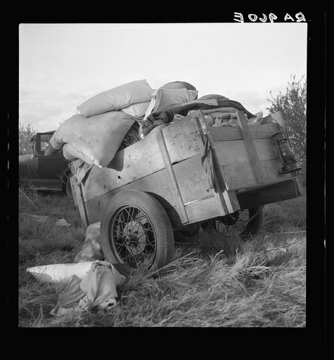 Roadside camp near Bakersfield, California. "Come to California." The wordly posessions of refugees from Texas dust, drought and depression