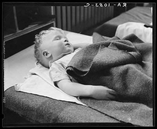 Sleeping boy at nursery school. Reedsville, West Virginia