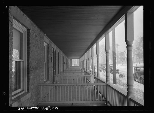 Back porches of a series of identical houses. Bound Brook, New Jersey