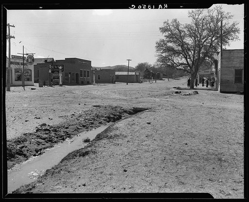 Main street of town. Shows irrigation ditch. Escalante, Utah