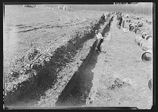 Sewage line being put through near sewage disposal plant at Berwyn project, Maryland
