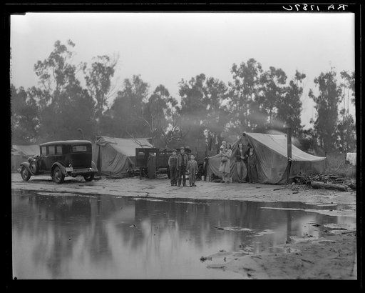 Migrant pea pickers camp in the rain. California