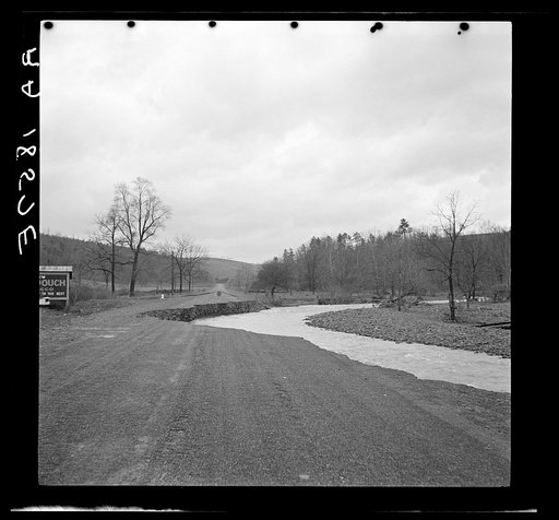 Road washed out by a small stream in West Virginia during spring floods