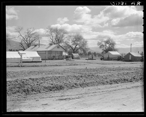 Kern County camp for migrants. Planned and erected by the Resettlement Administration fifteen miles out of Bakersfield, California. Partially occupied because there is not any work in the fields