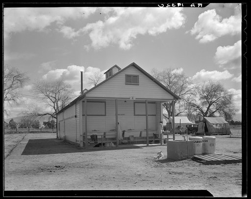 Utility units at Marysville resettlement camp. Shows sites and units, towels, hot shower, and laundry. California
