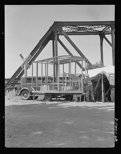 Mobile housing--a trend. One of the many housecars under construction by homeless people who formerly lived in tents. California