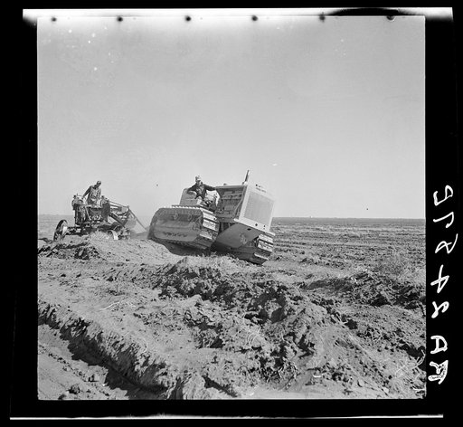 Leveling fields to prevent wind erosion on project near Liberal, Kansas