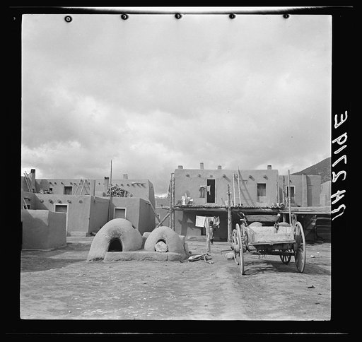 Pueblo at Taos, New Mexico. Ovens for cooking food in the foreground