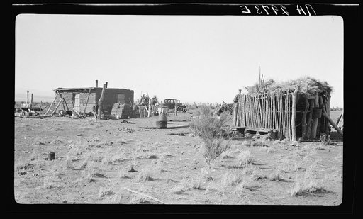 Houses formerly on land use project at Las Cruces, New Mexico. Note Mexican jacal at right
