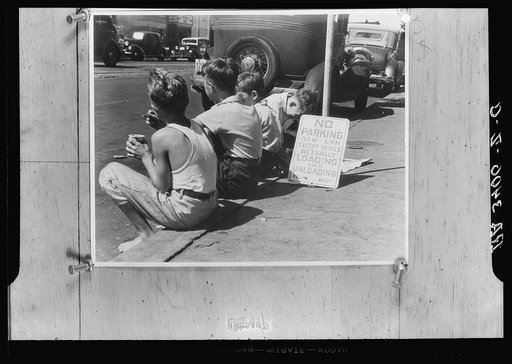 Boys sitting on curb. Washington, D.C.