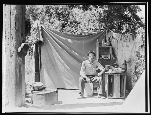 Jack Neill, "migratory fruit tramp," on banks of Pulah [Putah] Creek near Winters, California. He owns one acre subsistence farm near Porterville. Represented migratory laborers as speaker at Commonwealth Club, San Francisco (See published "Transactions" of the Club). Education: two years to Univers