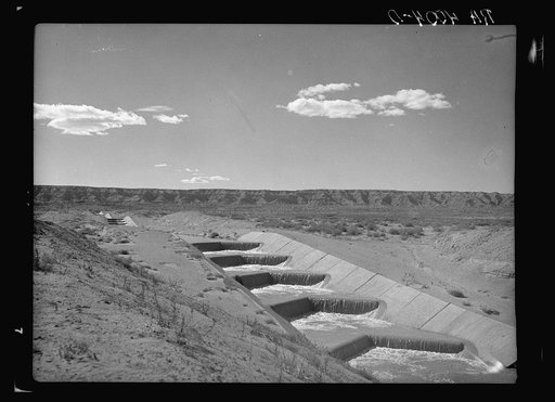 Water from the Rio Grande flowing through an irrigation canal. Sierra County, New Mexico