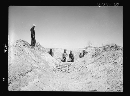 Working on one of the large irrigation canals. Bosque, New Mexico