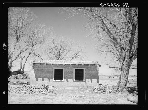 Adobe home almost completed. Bosque Farms, New Mexico