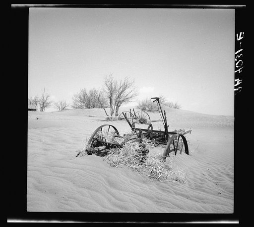 Buried farm machinery. Cimarron County, Oklahoma