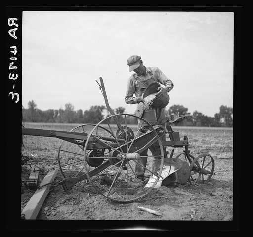 Rehabilitation client planting corn. Jefferson County, Kansas
