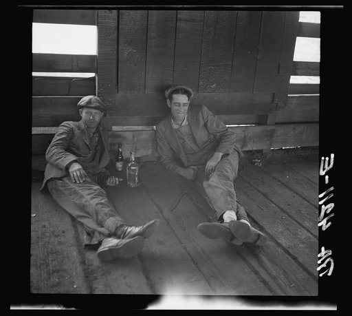 Drovers at rest in stockyards. Kansas City, Kansas