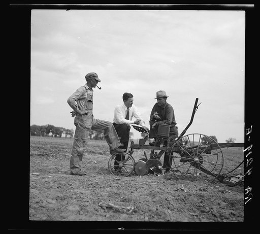 Discussing farm problems with country supervisor. Jefferson County, Kansas