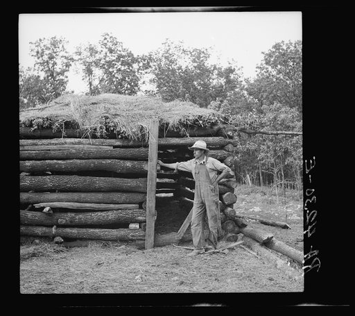 Log barn built by rehabilitation client. Cherokee County, Kansas