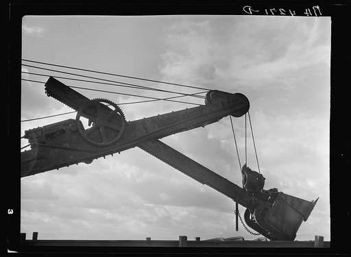 Steam shovels ruin good farmland in strip mining operations. Cherokee County, Kansas