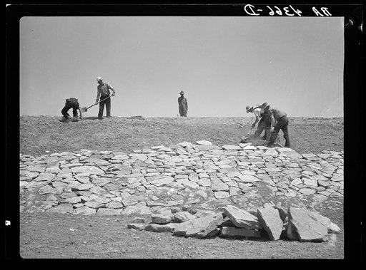 Working on the face of a stock water dam. Pine Ridge project, Sioux County, Nebraska