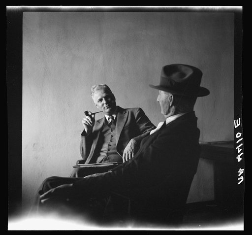 Supervisor conferring with farmer. Falls City, Nebraska